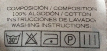 Etiqueta para sabanas de cuna de algodon 100 por 100.