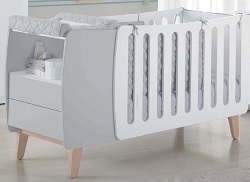 Cuna convertible en cama con cambiador