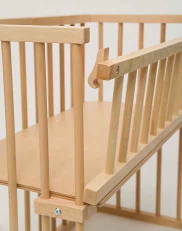 lateral barandilla abatible en mueble cuna